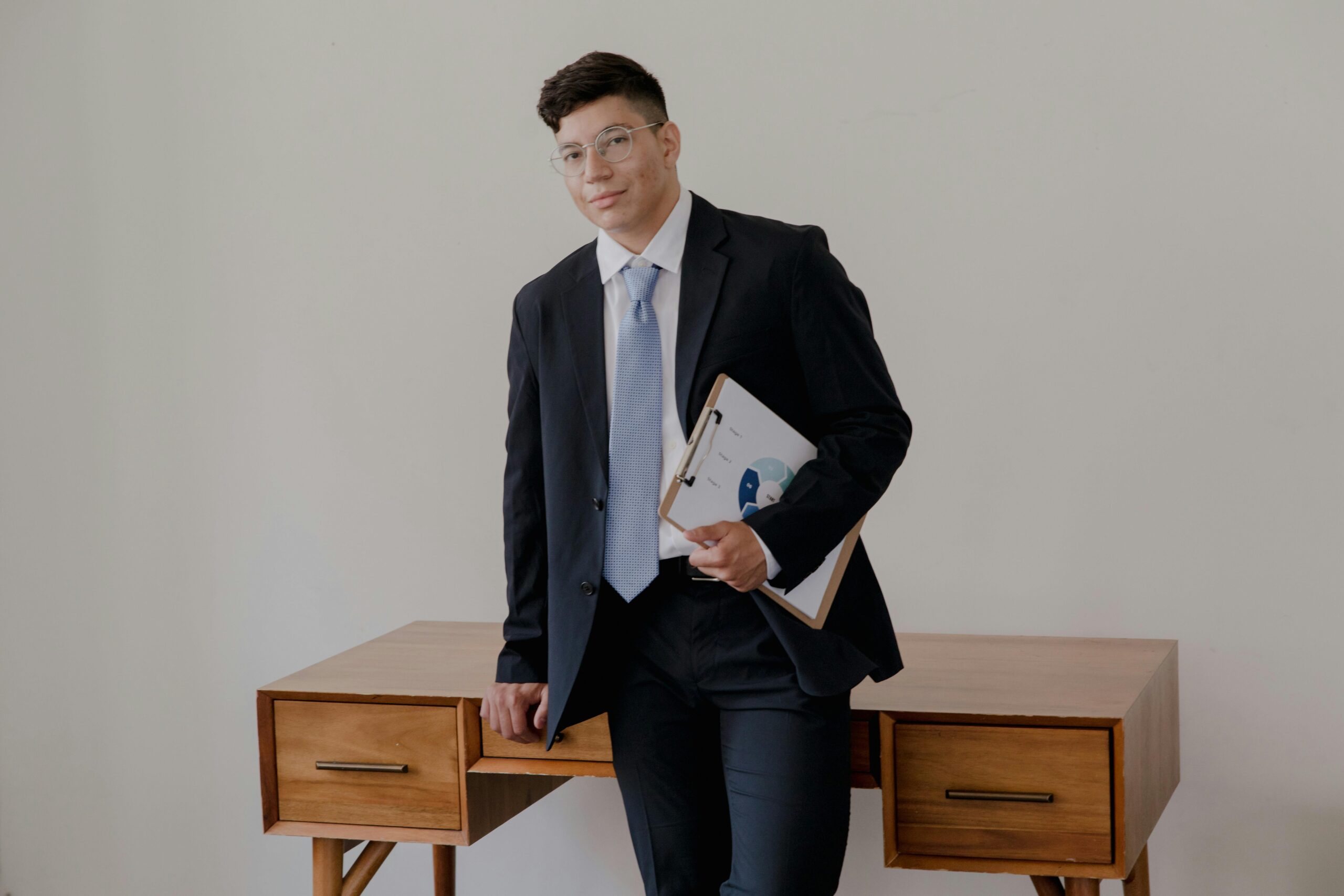 A good leader holding a clipboard