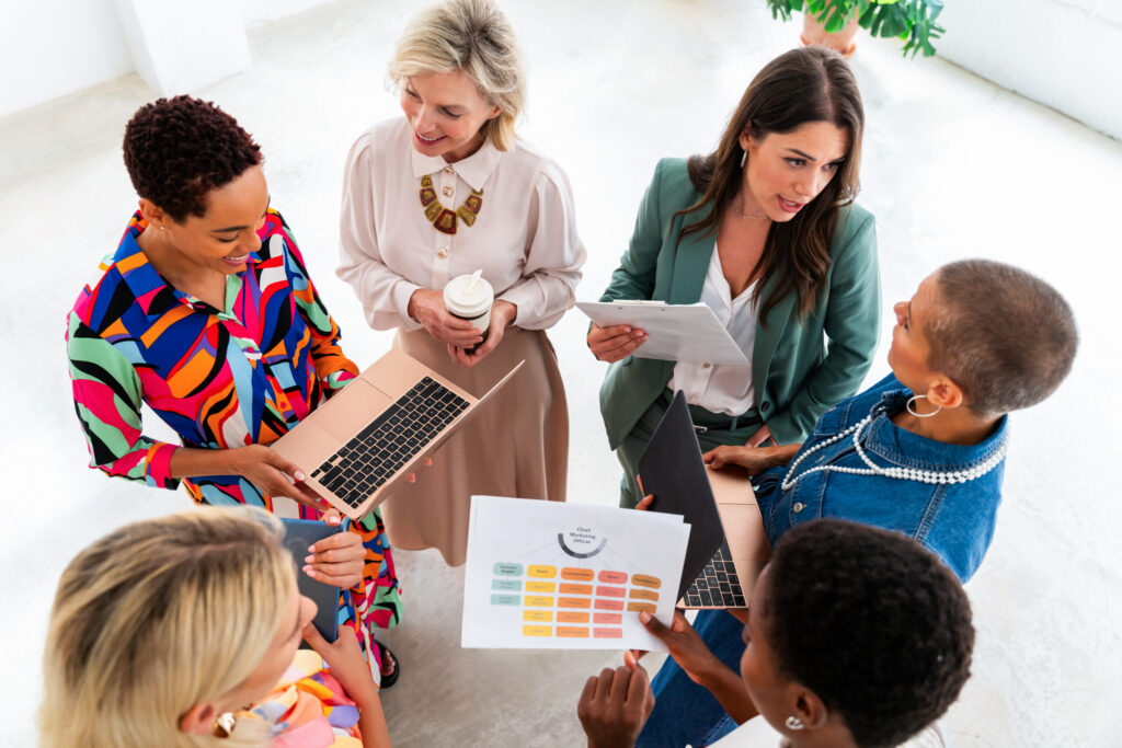 A group of women measuring brand awareness together